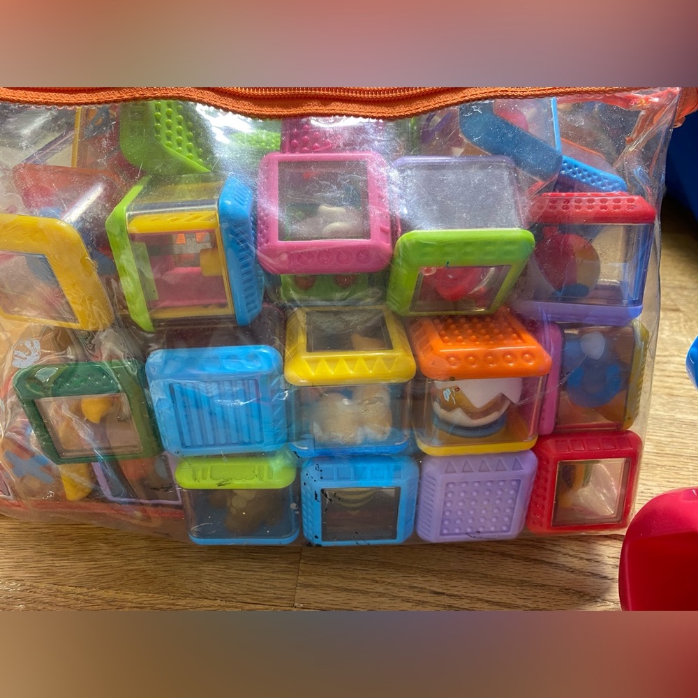 Fisher Peek-a-Blocks Rollin' Rumblin' Dump Truck sensory blocks - Picture 3 of 5